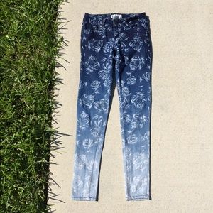 Floral fade skinny jeans
